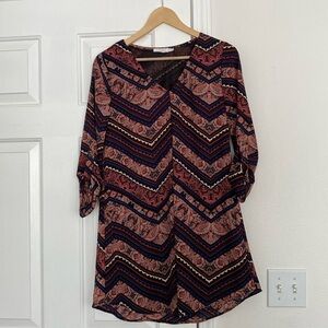 Lush v-neck shift mini dress with bold patterns.